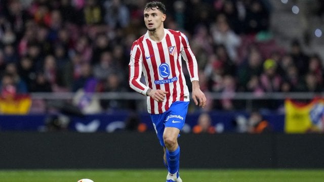 Marc Pubill con el Atlético