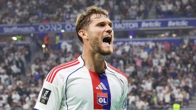 Tanner Tessmann avec l'OL