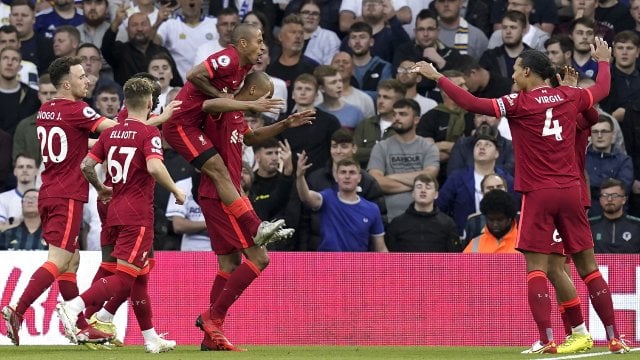 Les joueurs de Liverpool célèbrent le but de Mo' Salah.