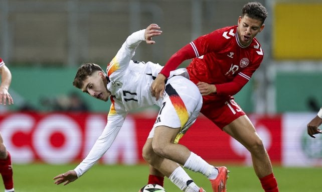 Clement Mutahi Bischoff en action avec le Danemark.