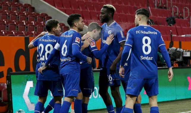 Les joueurs de Schalke 04 célébrant contre Augsbourg