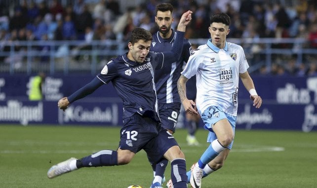 Arsen Zakharian (Real Sociedad) et Antonio Cordero (Malaga)