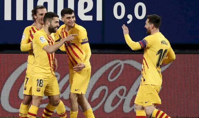 Antoine Griezmann, Pedri, Jordi Alba et Lionel Messi célèbrent un but pour le FC Barcelone