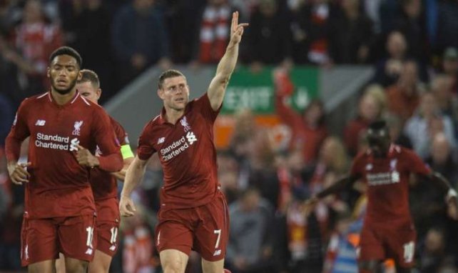 James Milner célèbre son but lors de la rencontre entre Liverpool et le PSG à Anfield
