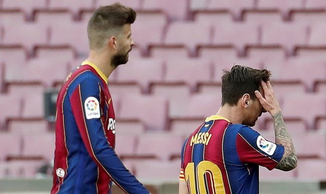 Gerard Piqué et Lionel Messi pendant un match du Barça au Camp Nou