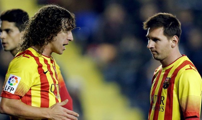 Carles Puyol et Lionel Messi en 2014